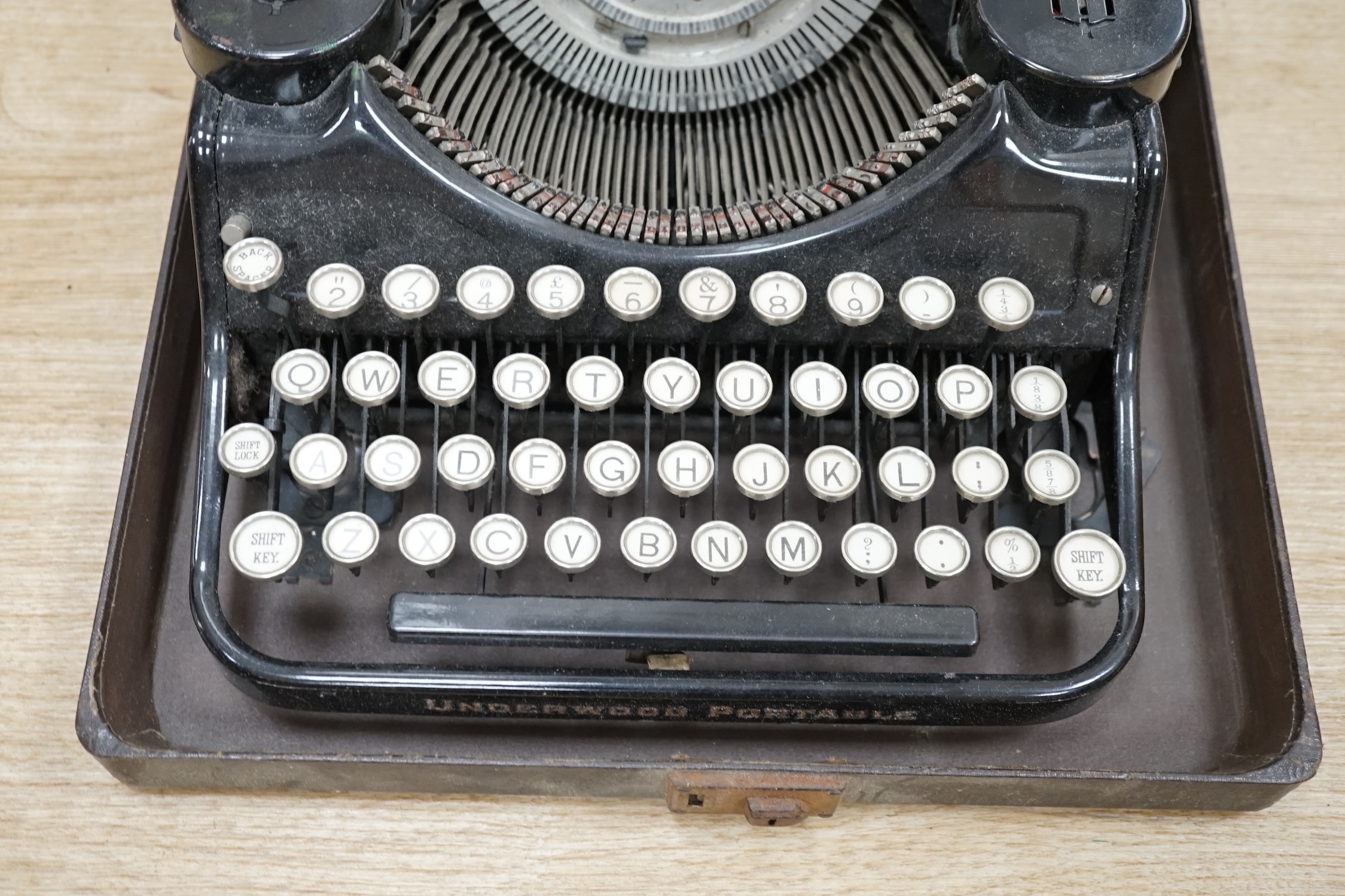 A cased Underwood typewriter, 31cm x 31cm